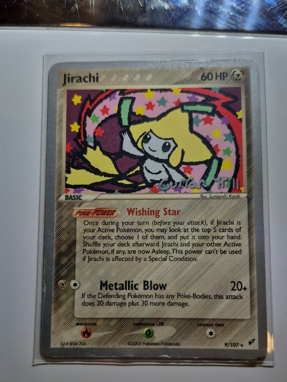 Pokemon Jirachi Holographic Card - Yellow Pink Red Green Blue
